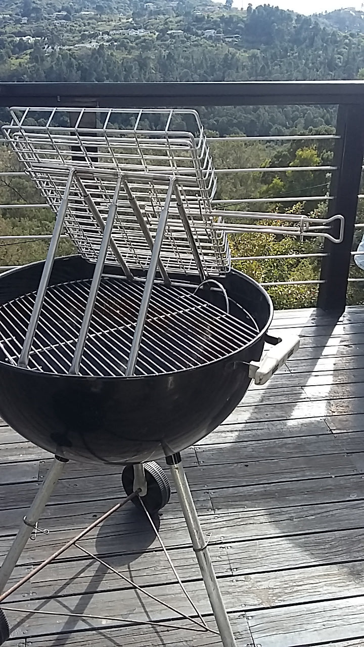 Crossfire stand used on a round kettle braai